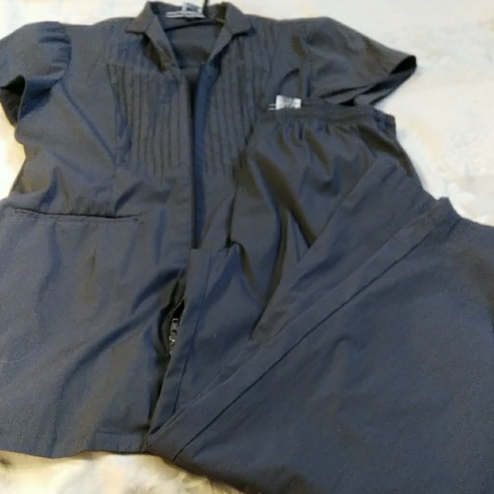 Women's scrubs size Large fits 14